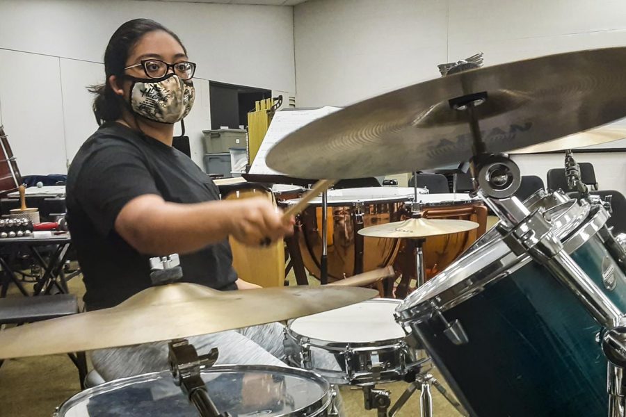 Maggie Ibarra is in the school band. She enjoys playing the drums ever since she was little. 