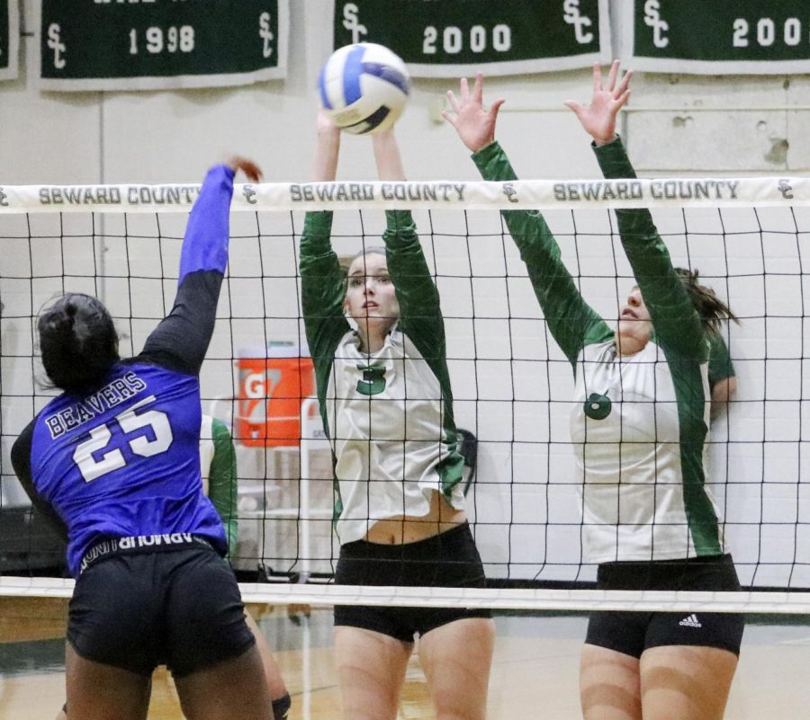 Lady Saints Brooke Katen and Gabriela Badilla block Pratt Community College’s Avery Smith at the net. Seward had six blocks on the night in the 3-0 win over the Beavers. SCCC now advances to the se