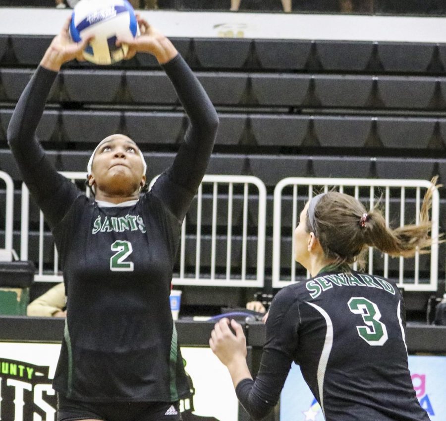 Ileim Terrero, freshman from Santa Domingo, Dominican Republic, calls a play and sets up Brooke Katen. Terrero has had to take on more responsibility on the court with the injury to Yunju Lee.