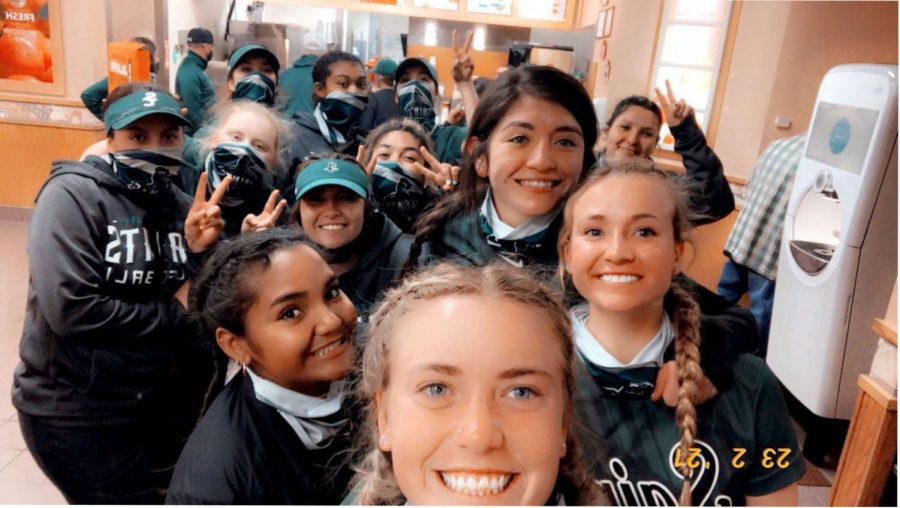 Ireland Caro, a freshman and the Seward County Community College softball team pose together to take a team photo while traveling to  La Junta, Colorado for a game. The Lady Saints won the second game but lost the first one. 