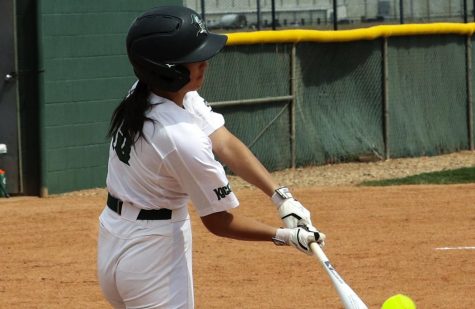 Ashley Low swings big and comes up with a home run against Northwest Kansas Technical College. Low, a center fielder for the Lady Saints is a freshman from Calgary, Canada. The Lady Saints won the first game against NWKTC 18-1 and the second game 9-5. 