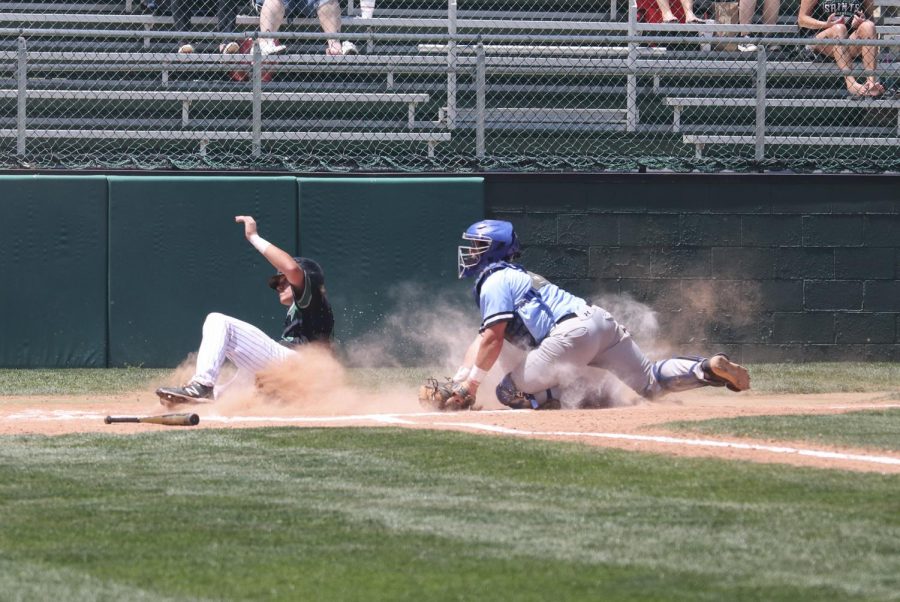 Wyatt Grant slides home on a close call, but is safe. AJ Folds hit the ball that sent Kase Johnson and Grant across the plate. 
