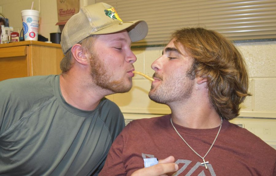 Jaxson Gregg, freshman from Fort Worth, Texas, and his friend Tristan Curless, freshman from Amarillo, Texas, shares a french fry.