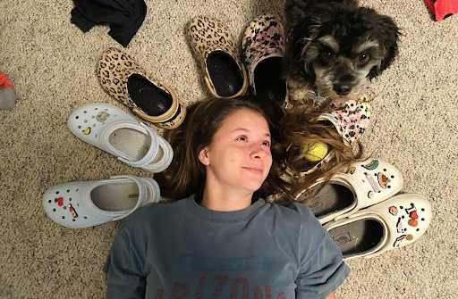 Halle Payton, Liberal freshman, shows off just a few pairs of Crocs that she owns. She claims the shoes are comfortable and fashionable.