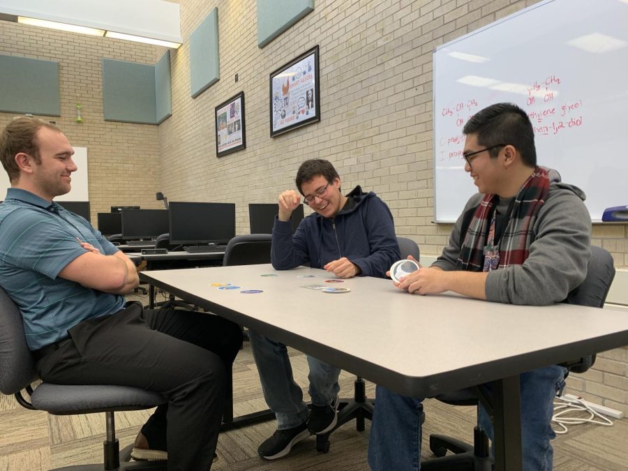 SCribbles members Melvin Le, Josh Swanson and Shandon Classen take part in a club favorite game “Tell Tale”. This game involves coming up with a story based on the three cards one draws. 
Le says “The game is a great way to showcase your creativity”. 
