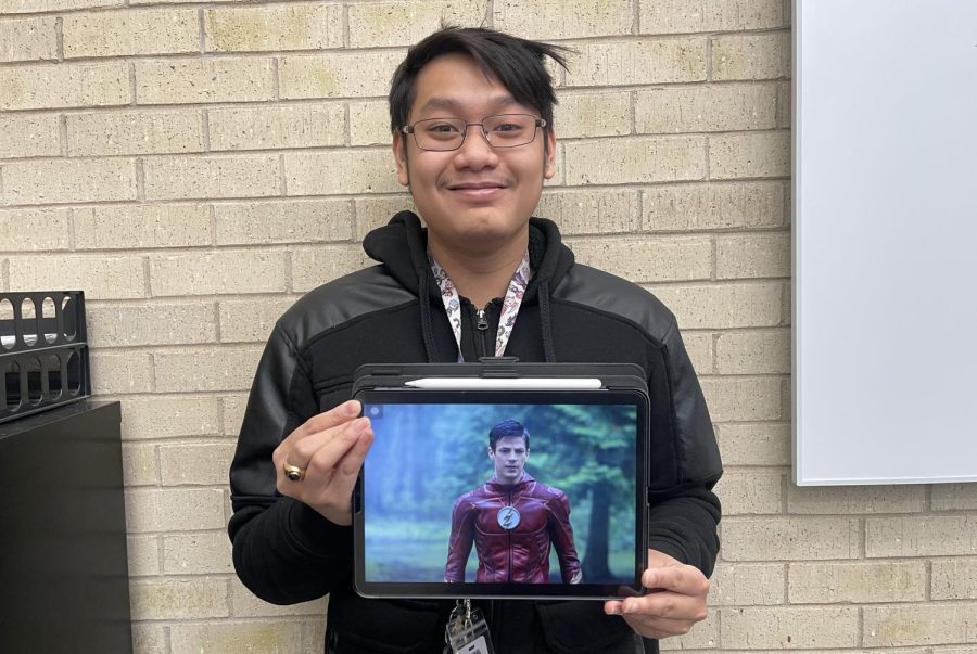 Dennis Le, a nursing major from Liberal, holds a picture of his childhood celebrity crush, Grant Gustin.