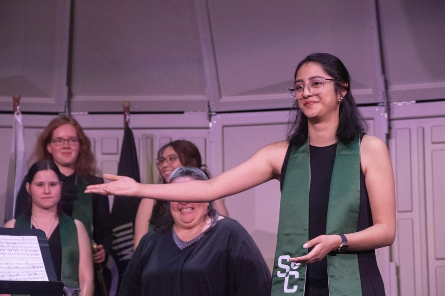 Choir instructor Magda Silva traded places with one of her mentored students Allegra Temores. Silva mentioned that Temores was usually extremely quiet and reserved, she also complimented her willingness to not shy away from the opportunity she had to lead the choir during one of the performances. 