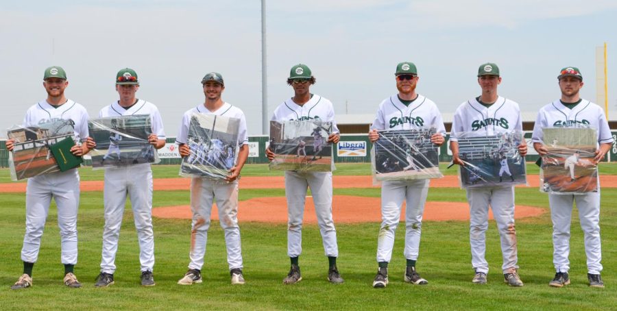 The sophomores were recognized on the field instead of walking across the stage during their doubleheader. They received their diplomas and a picture of themselves playing during their career at Seward. [Pictured left to right are Dylan Day, Reed Thomas, Jase Schneider, Mason Martinez, Gannon Hardin, Brody Boisvert, and Zach Walker]   