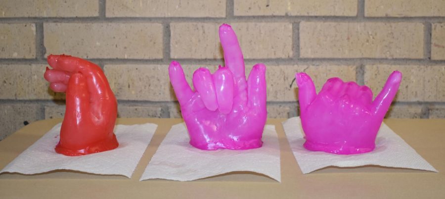 The finished product is a vibrant, delicate wax sculpture of your hand. Set to the side to dry, SCCC presented a wide variety of wax hands this Wednesday afternoon.