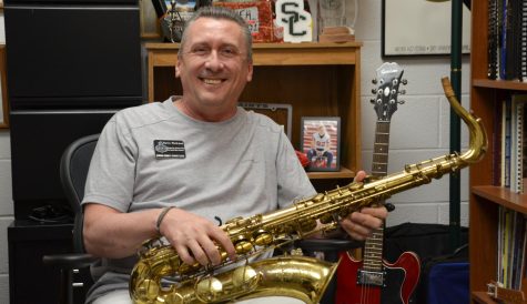 Director of Humanities and Social Sciences, Darin Workman is from Hastings, Nebraska. He not only is a teacher but he also plays his own instruments such as his favorite the saxophone which he learned in fourth grade. 