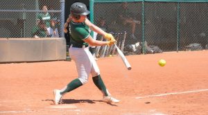 Swinging her bat to hit the ball is catcher Avery Ragsdale, a freshman from Fort Gibson, Oklahoma. In the second game Ragsdale gained two runs that she batted in resulting in her now having 42 runs that she batted in. 