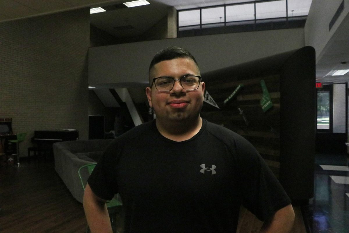 Marcos Montoya takes a break from working on his personal health from working at the gym. He says “That’s [the gym] my second home, basically. I’m there more than I am at my own house.” 