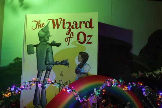 Visitors walk the yellow brick road through Dorothy’s House, “The Land of Oz” with Dorothy-Gale tour guides