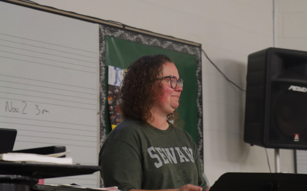 Instrumental music instructor and now new film music appreciation professor Claire Thompson lectures the class.
