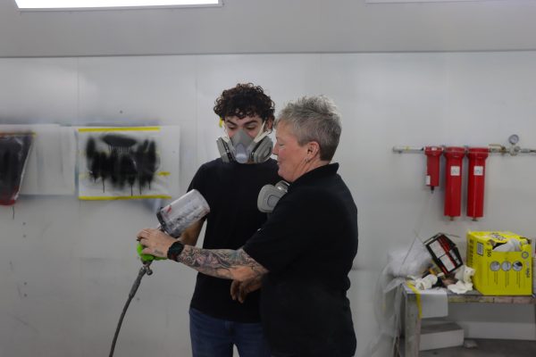 Besides teaching about the mechanical side of vehicles, Bree Downs also instructs students how to paint the outer body as well. 