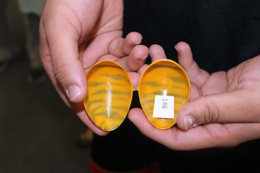 The eggs were filled with numbers, and the students would report the numbers to a staff member to receive their prize.