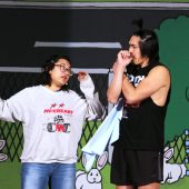 Lucy Can Pelt (Biviana Rodriguez) talks to Linus Van Pelt (Andy Dinh) about the many qualities of Charlie Brown (Matthew Schmitt) during musical rehearsal.