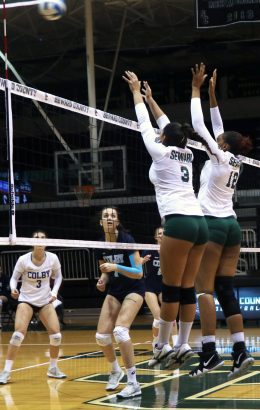 Sophomores Luz Sierra and Esmadar Tavares block a Colby Community College hit. As a team, the Lady Saints finished with six blocks.