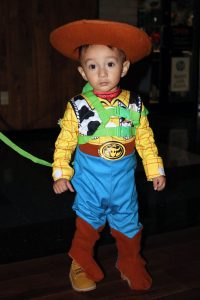 Sebastian Moreno poses during SCCC’s Trick or Treat Street in his Sheriff Woody from Toy Story costume. There was a variety of different costumes at the event.