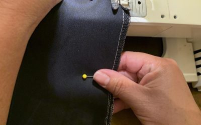 The first step in sewing a mask is to measure the fabric, cut the pattern out and sew all four sides of the mask, leaving at least two inches of space open for the filter to fit inside.