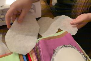 Next, a filter is made with polyethylene fabric and pellon interfacing for layers inside the filter. The polyethylene fabric will be folded together, to be sewn. Once finished, the filter is placed inside the reusable cloth mask.