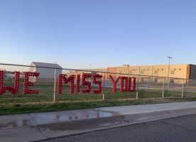 McArthur Elementary school placed these cups to spell “We miss you” on the fence to show their students that they are still thinking of them through tough times.