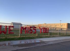 McArthur Elementary school placed these cups to spell “We miss you” on the fence to show their students that they are still thinking of them through tough times.