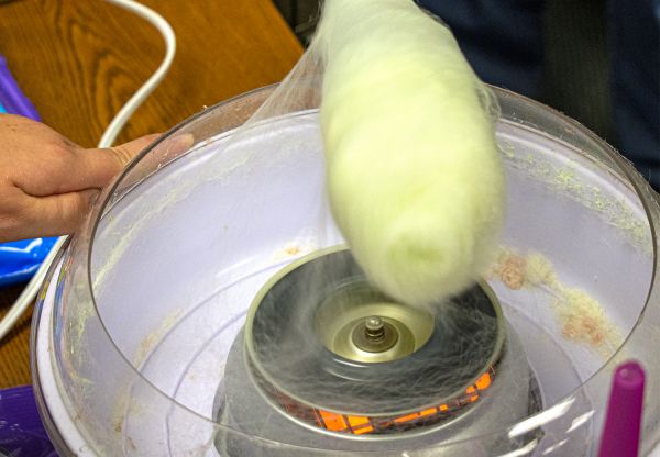 The Crusader News crew made cotton candy during their class. It was part of a lesson on photography. Students learned to take photos of an activity and write cutlines.