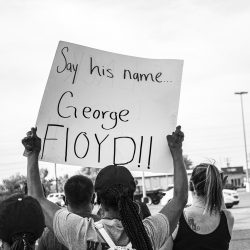 Protester made signs that voicing their opinions. The peaceful protesters in Liberal marched down Kansas Ave.