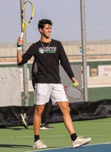 Raul Centeno stops to listen to the coach during practice. The sophomore is from Portoveijo, Ecuador.