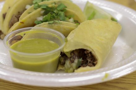 Taqueria Azteca includes a green salsa on the side with most of their dishes, not just tacos.